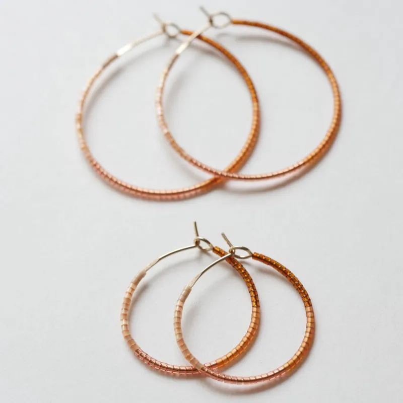 Meerna - 1.25" & 1.75" 14 KT Gold Hoops sold by Daldanea