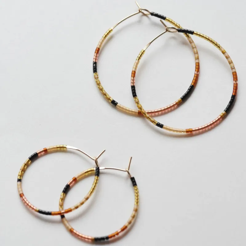 Syeda - 1.25" & 1.75" 14 KT Gold Hoops sold by Daldanea