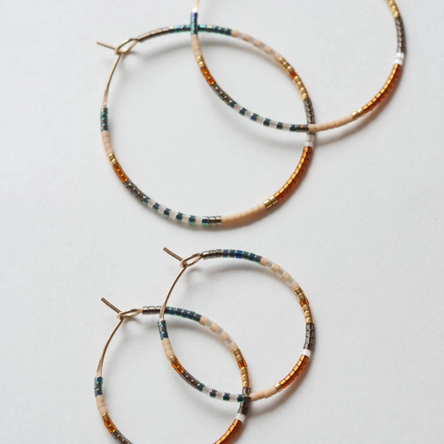 Noura - 1.25" & 1.75" 14 KT Gold Hoops sold by Daldanea