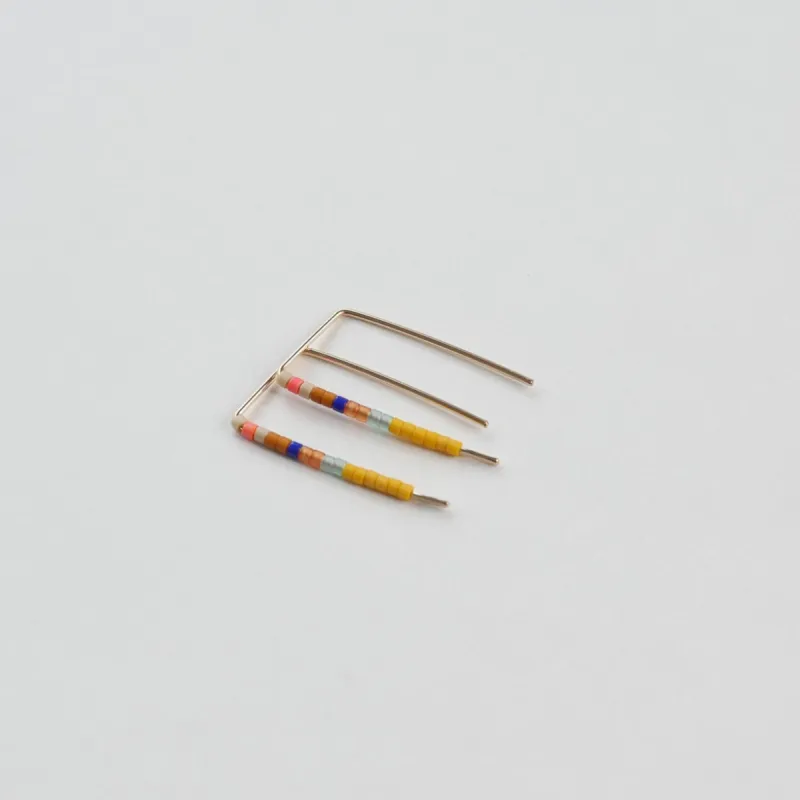 Charlotte - 14 KT Gold Bar Studs sold by Daldanea