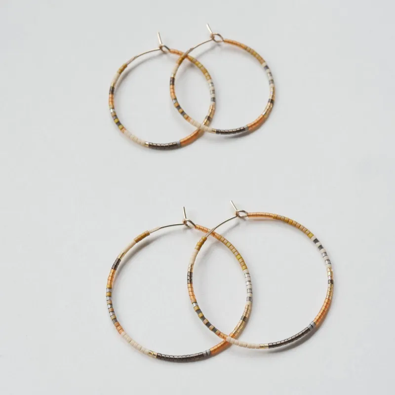 Adi - 1.25" & 1.75" 14 KT Gold Hoops sold by Daldanea