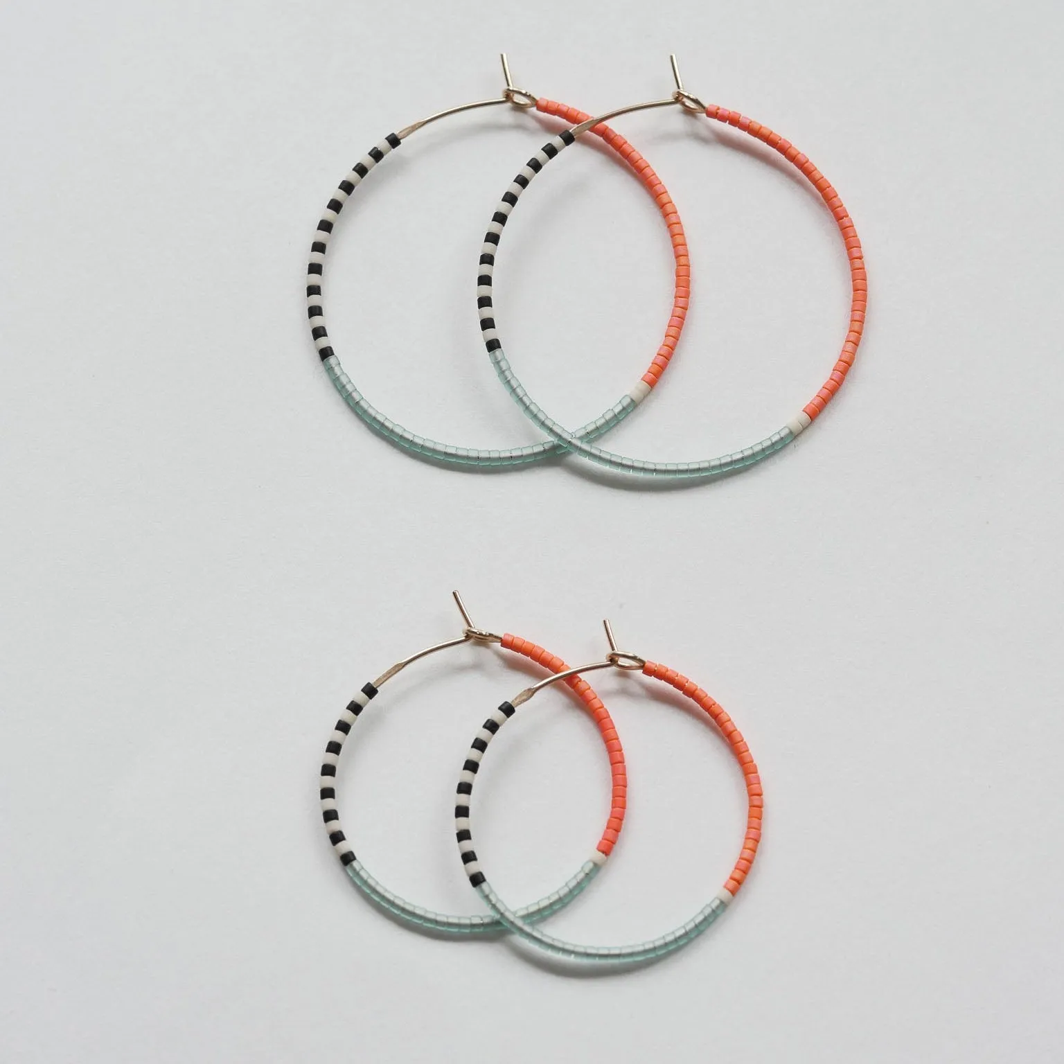 Pantha - 1.25" & 1.75" 14 KT Gold Hoops sold by Daldanea