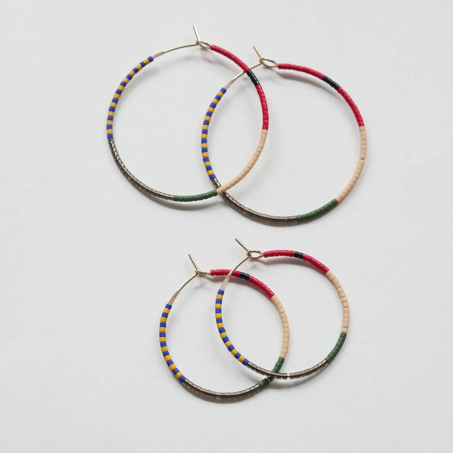 Lovedeep - 1.25" & 1.75" 14 KT Gold Hoops sold by Daldanea