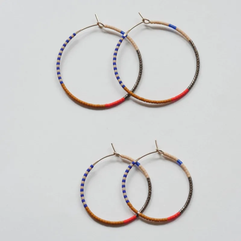 Jaya - 1.25" & 1.75" 14 KT Gold Hoops sold by Daldanea