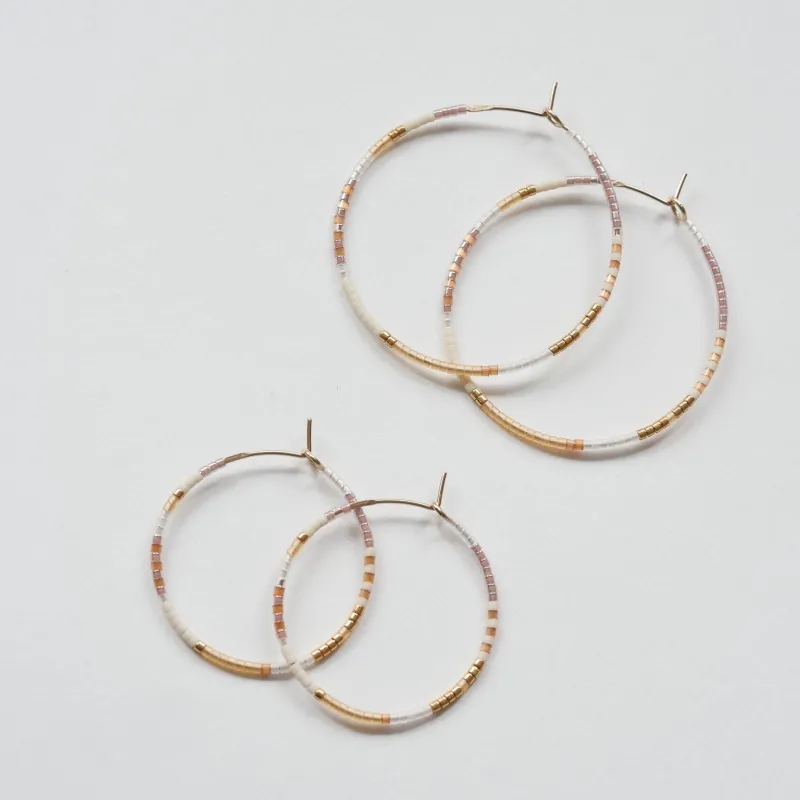Nive - 1.25" & 1.75" 14 KT Gold Hoops sold by Daldanea