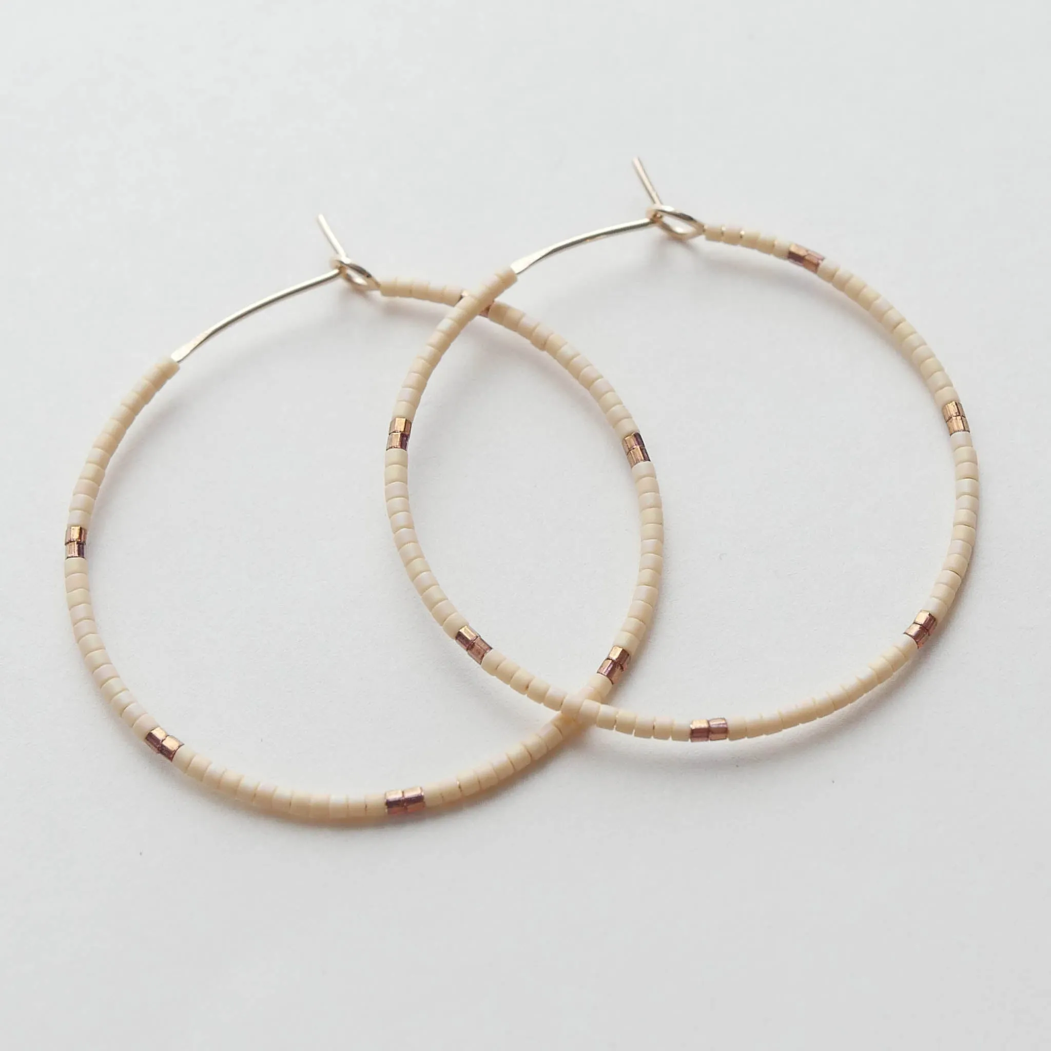 Tawa - 1.25" & 1.75" 14 KT Gold Hoops sold by Daldanea