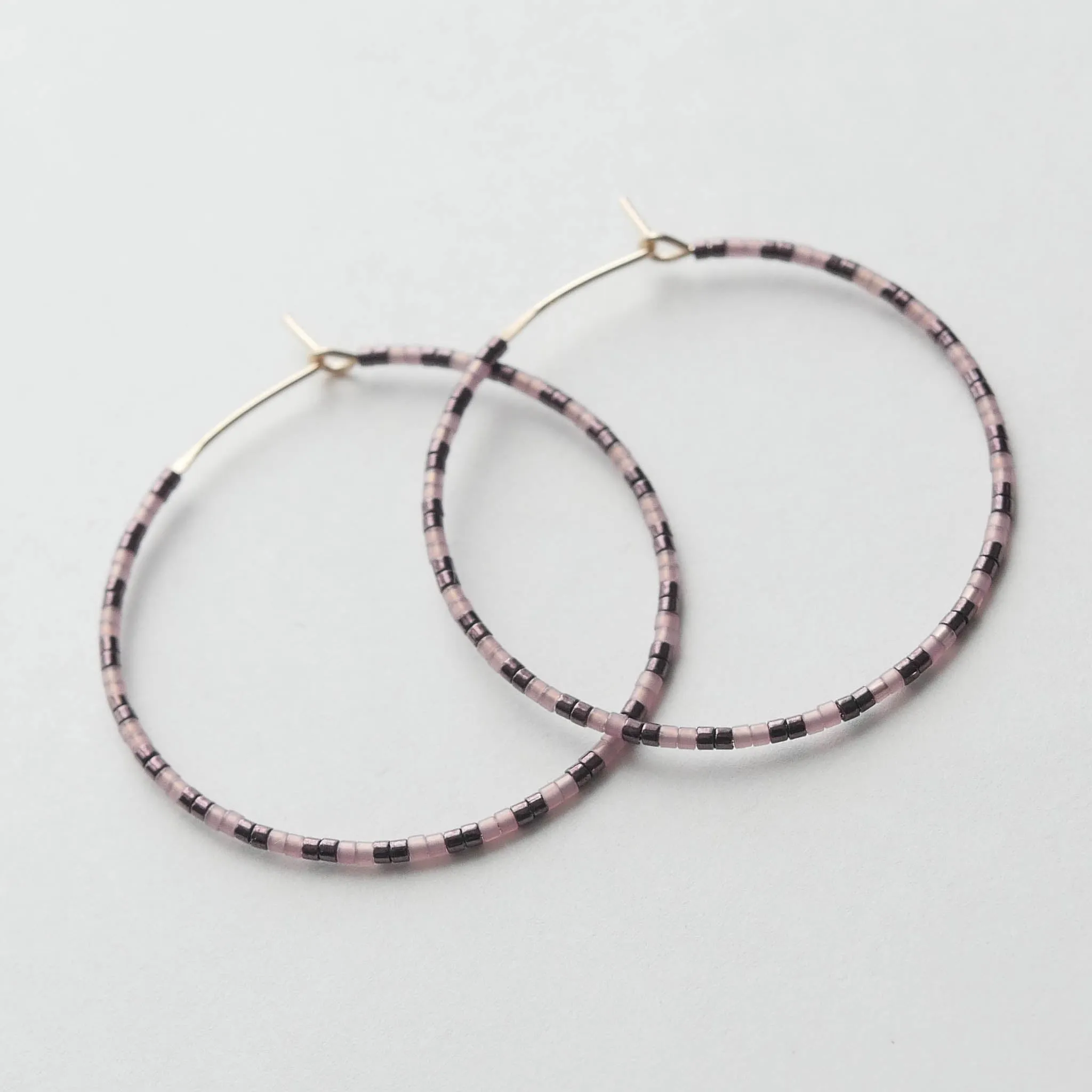 Rabi - 1.25" & 1.75" 14 KT Gold Hoops sold by Daldanea