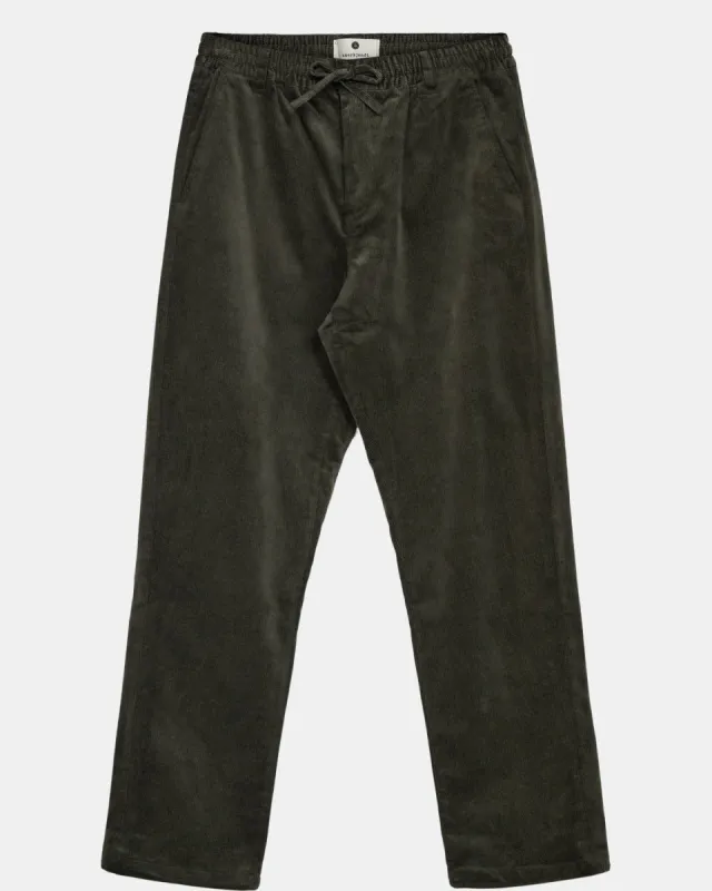 AKJAN ELASTIC CORD PANTS - Forest night sold by anerkjendt