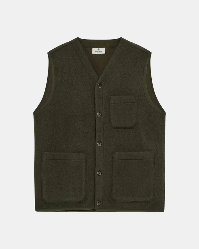 AKRASMUS BOILED WOOL GILET - Forest night sold by anerkjendt