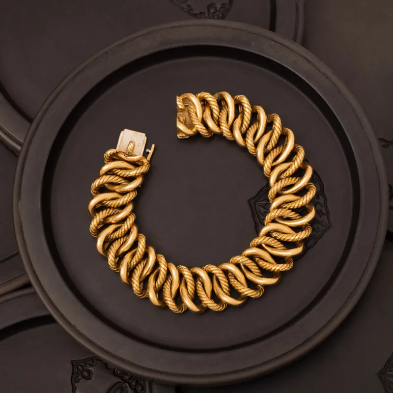 VINTAGE GEORGES LENFANT OJ PERRIN 18 KARAT ROPE SCROLL BRACELET sold by Stephanie Windsor