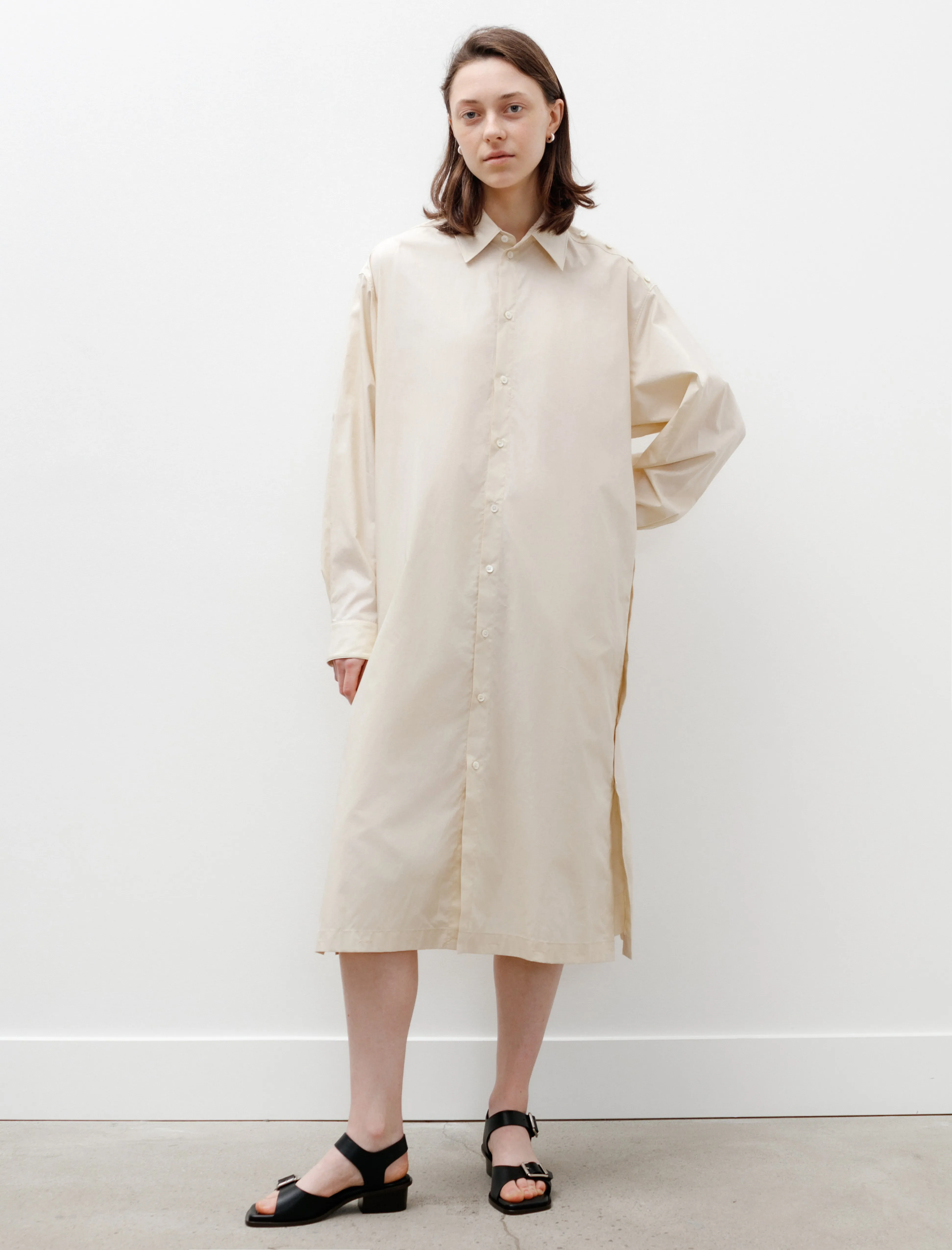 Playful Buttoned Shirt Dress Cream sold by SHOP NEIGHBOR