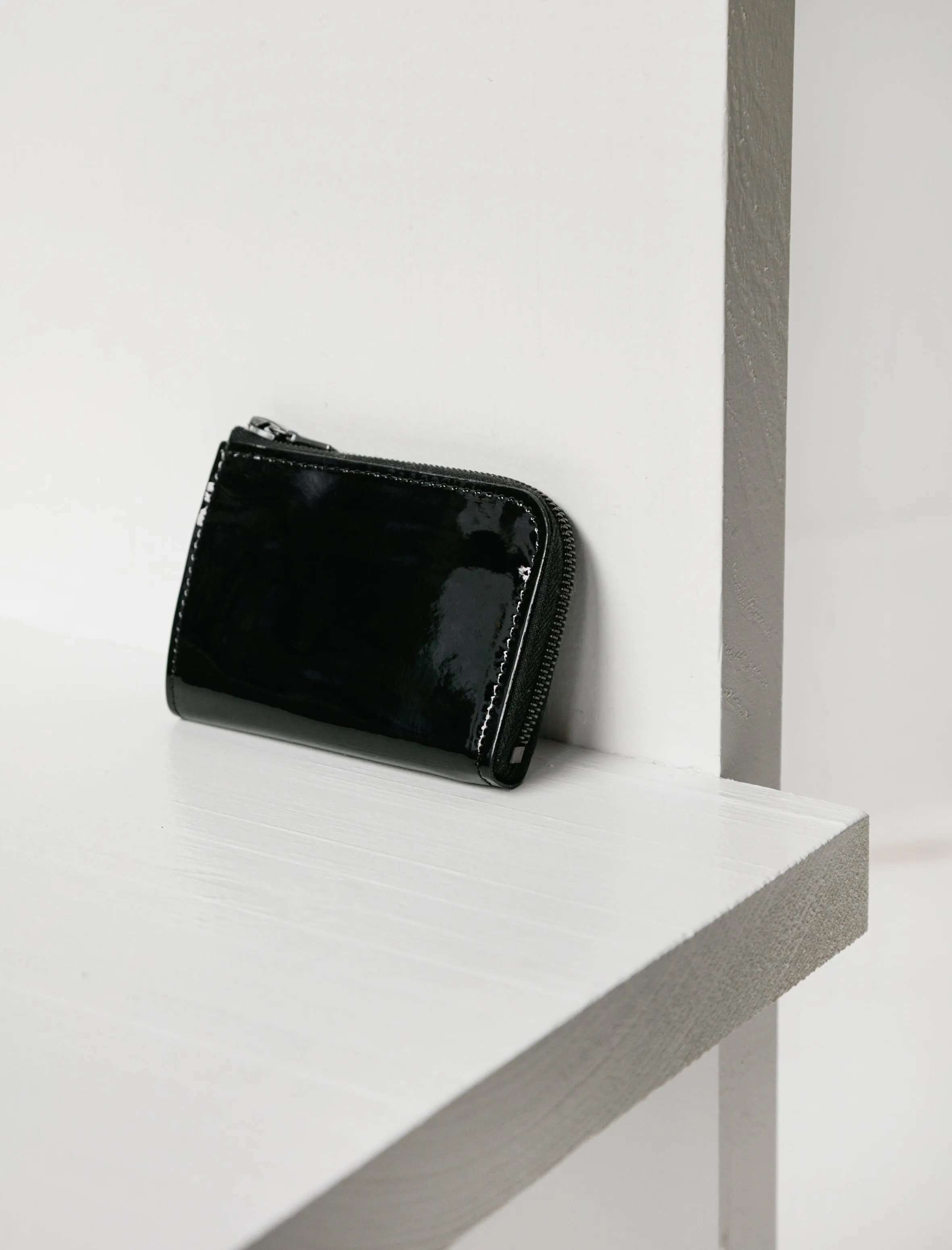 275 Mini Zipped Wallet Patent Calf sold by SHOP NEIGHBOR