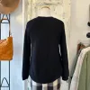 Indi & Cold // Black Cotton Knit Sweater sold by Coal Miner's Daughter