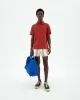 Polo rojo hemp sold by Thinking Mu