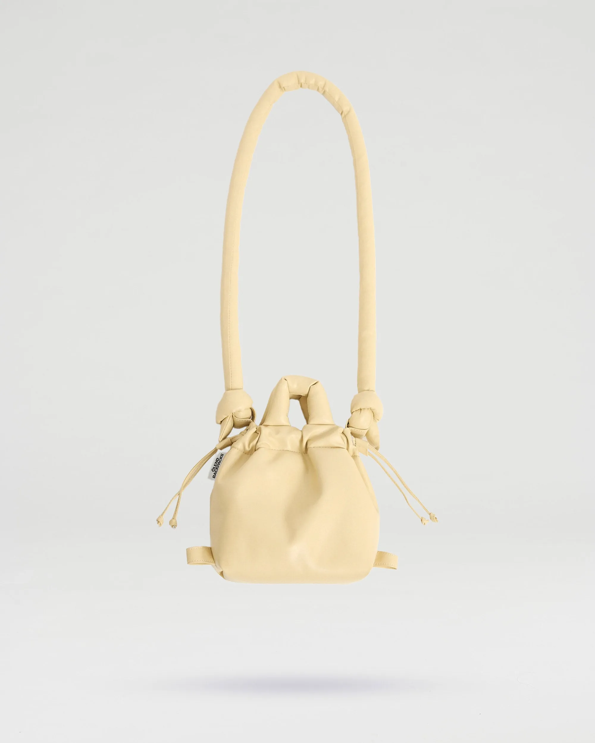 Butter Yellow Micro Ona vegan leather bag sold by Thinking Mu