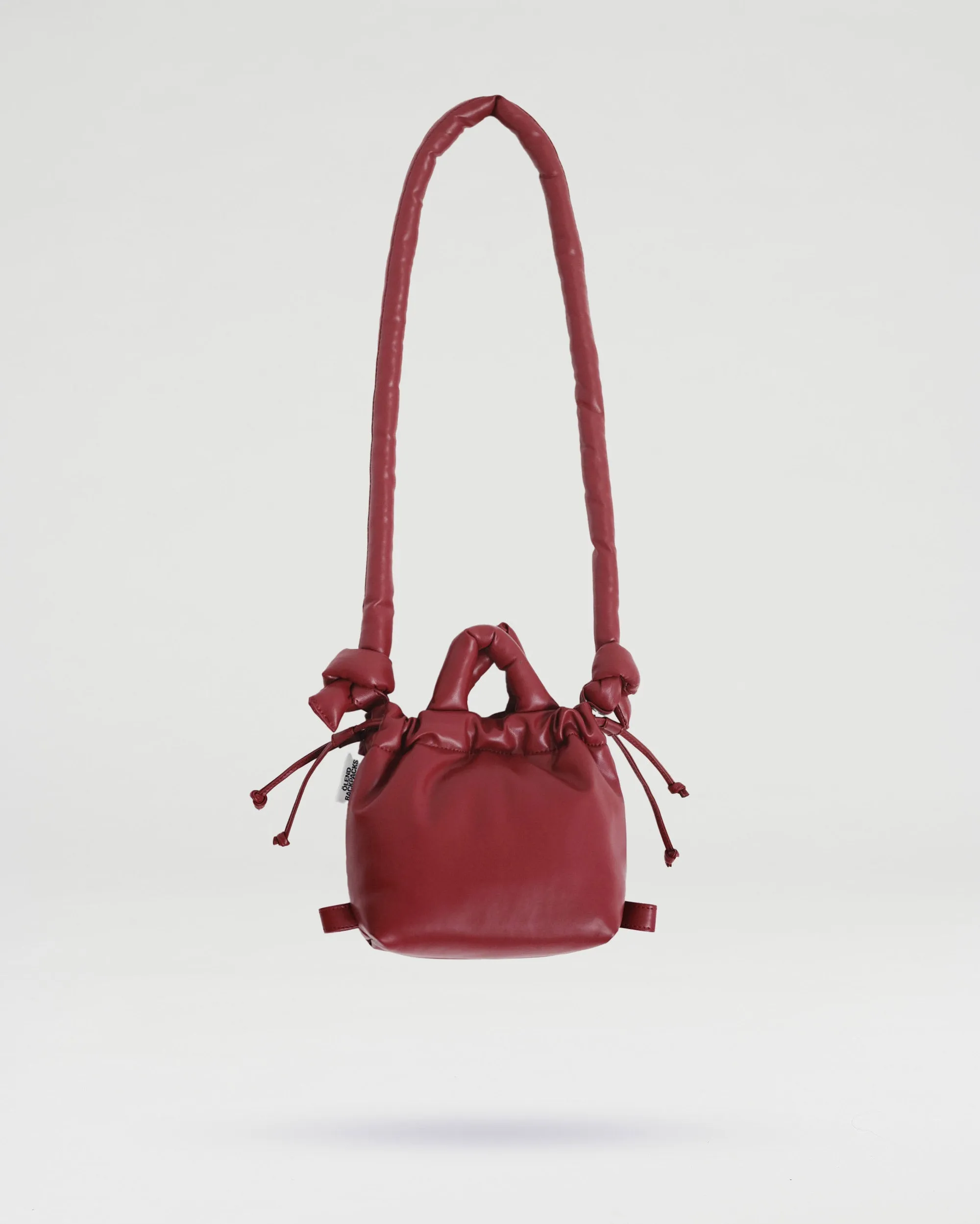 Cherry Red Micro Ona vegan leather bag sold by Thinking Mu