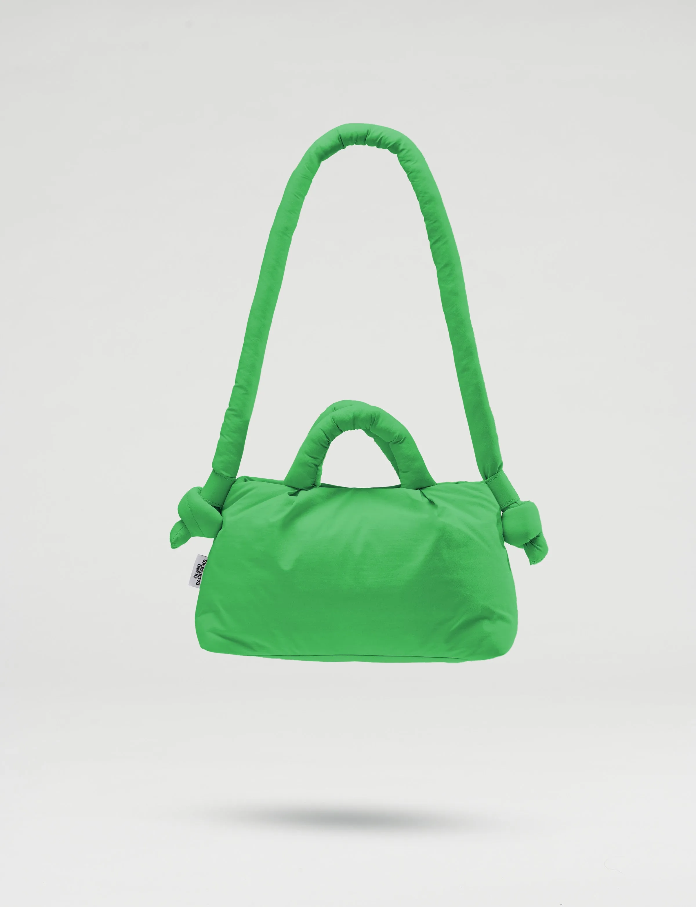 Green Miniona soft bag sold by Thinking Mu