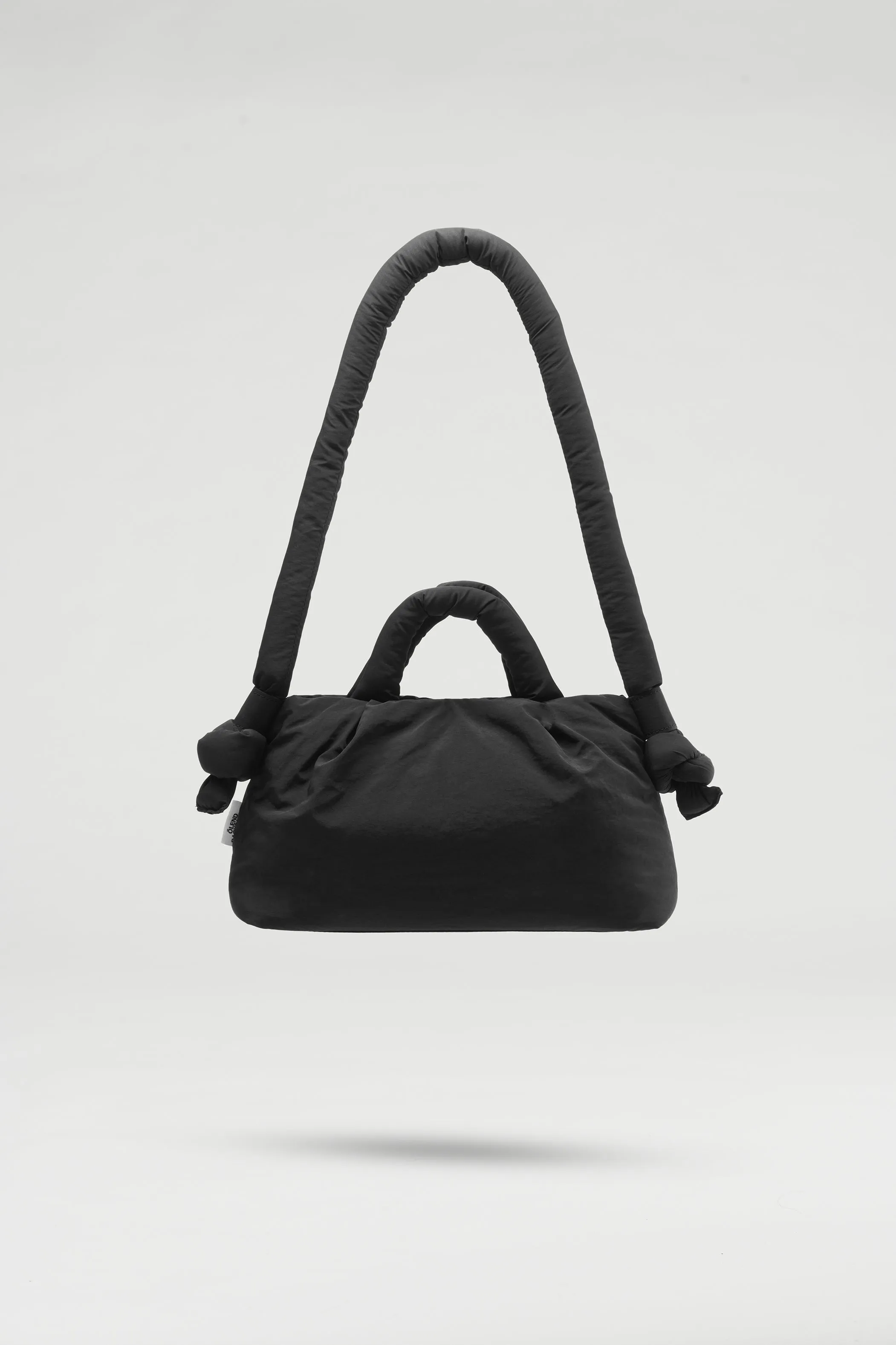 Black Miniona soft bag sold by Thinking Mu