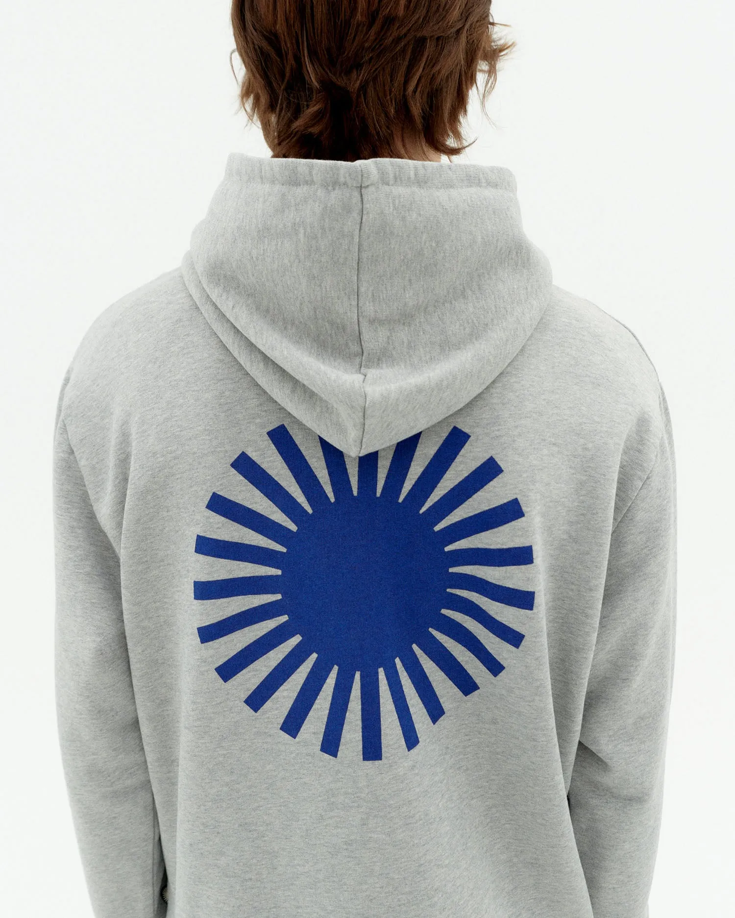 Hoodie gris sol espalda azul Simon sold by Thinking Mu
