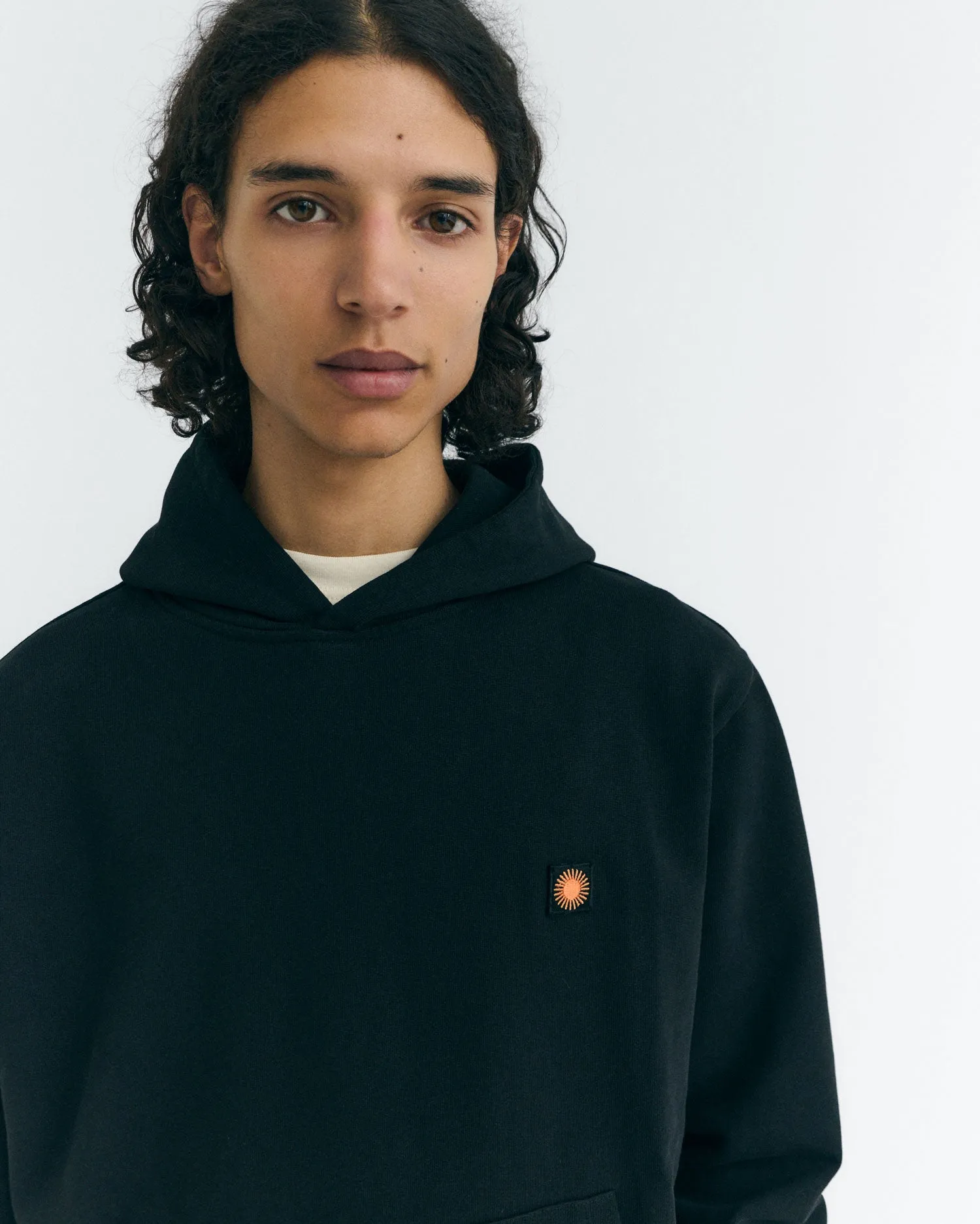 Hoodie negro sol naranja espalda Simon sold by Thinking Mu product image thumbnail 5