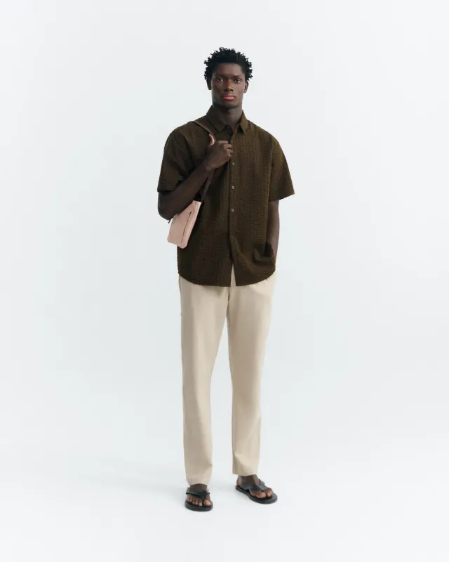 Pantalón recto beige Travel light made by Thinking Mu