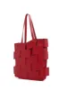 Laquered Tote Bag in Red Topaz Leather sold by Gabriela Hearst