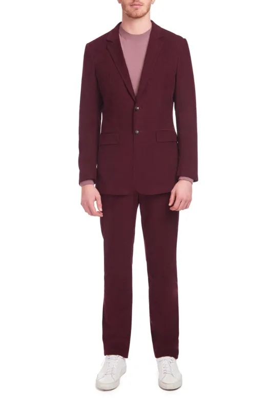 Ernest Pant in Prune Corduroy sold by Gabriela Hearst