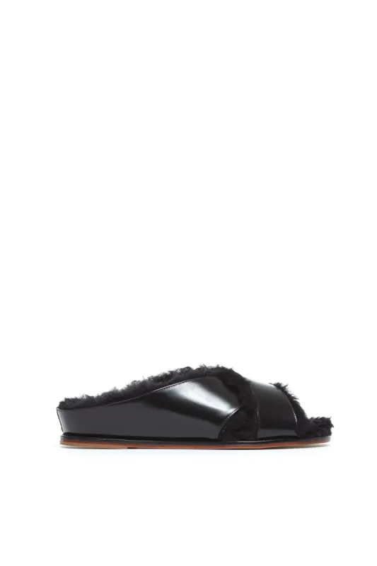 Ellington Flat Slide in Black Leather with Wool Fur sold by Gabriela Hearst
