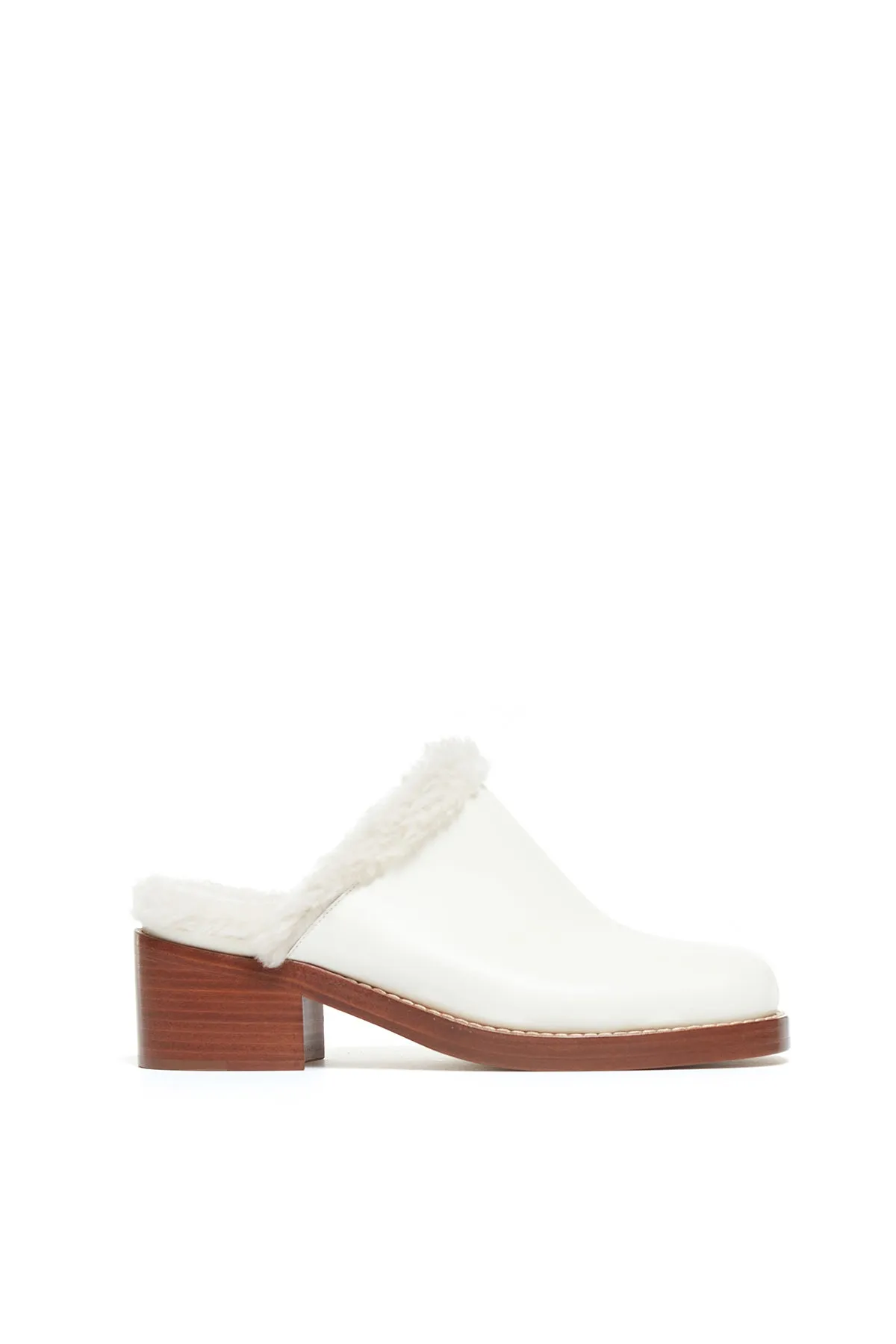 Armin Mules in Cream Leather with Wool Fur sold by Gabriela Hearst