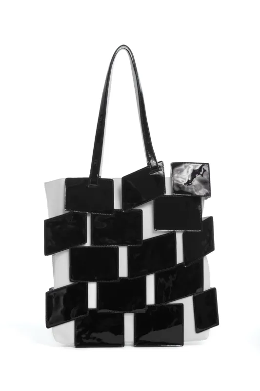 Laquered Tote Bag in Black Patchwork Lacquered Leather sold by Gabriela Hearst