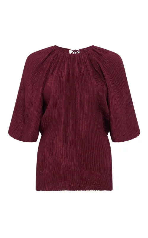 Nula Top in Bordeaux Plisse Silk sold by Gabriela Hearst