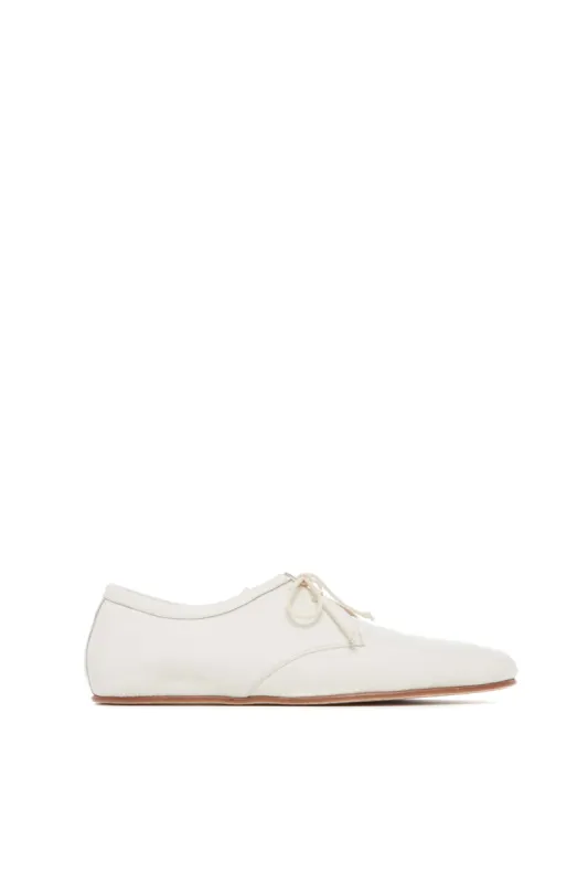Luca Flat Shoe in Cream Textured Leather sold by Gabriela Hearst