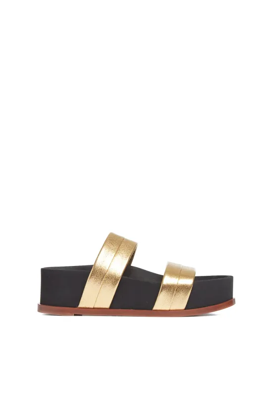 Striker Platform Sandal in Gold Nappa Leather sold by Gabriela Hearst