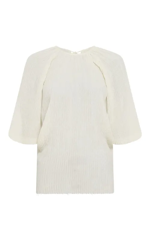 Nula Top in Ivory Plisse Silk sold by Gabriela Hearst