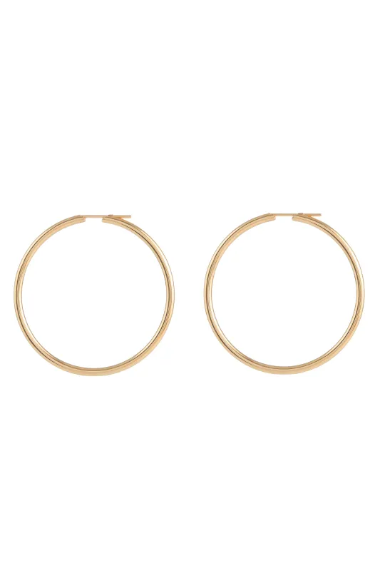 Large Loop Earrings in 18K Yellow Gold sold by Gabriela Hearst