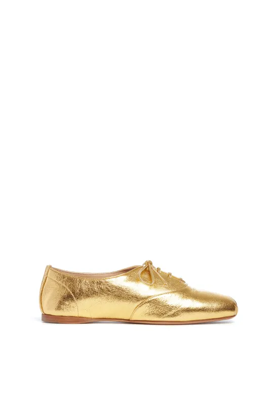 Maya Flat Shoe in Gold Nappa Leather sold by Gabriela Hearst
