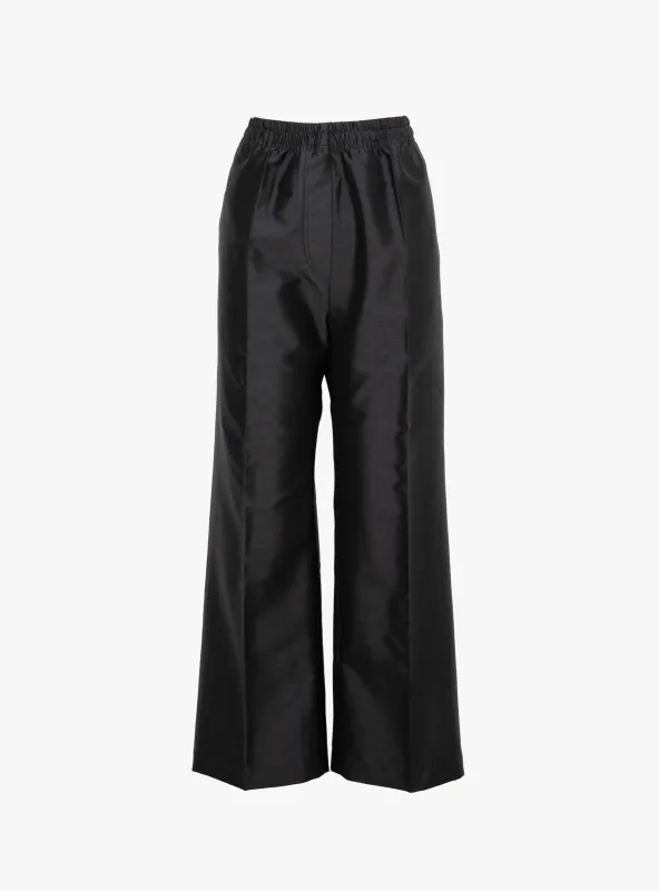 Phevati Trousers Black sold by Garbstore