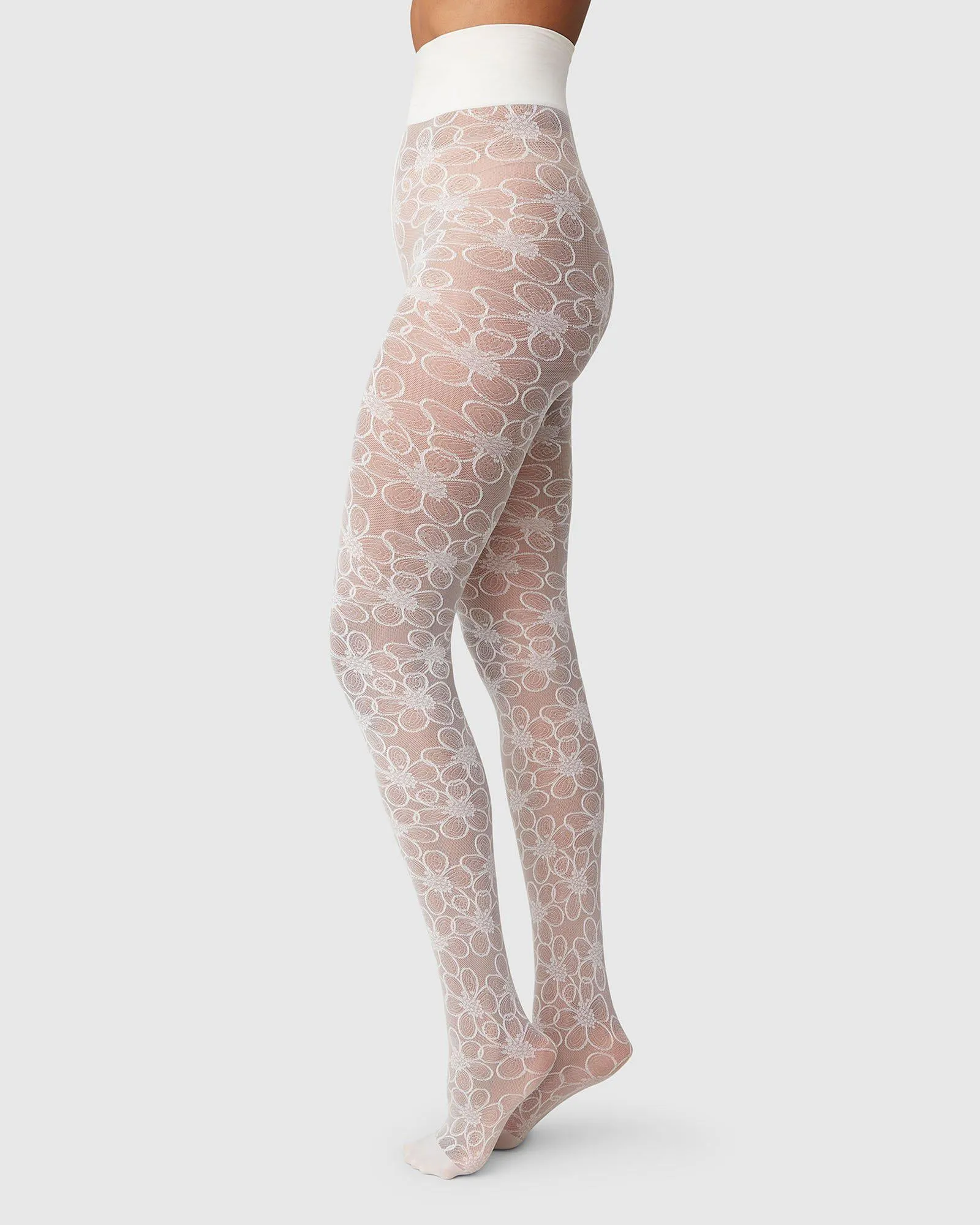 Maja Flower Tights sold by SWEDISH STOCKINGS