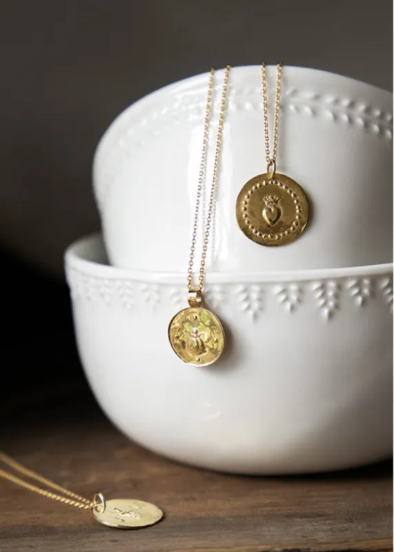 Médaille empreinte en or 18 carats Amore sold by Alix D. Reynis