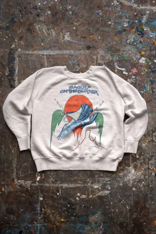 EAGLES ON THE BORDER SHRUNKEN SWEATSHIRT sold by MadeWorn
