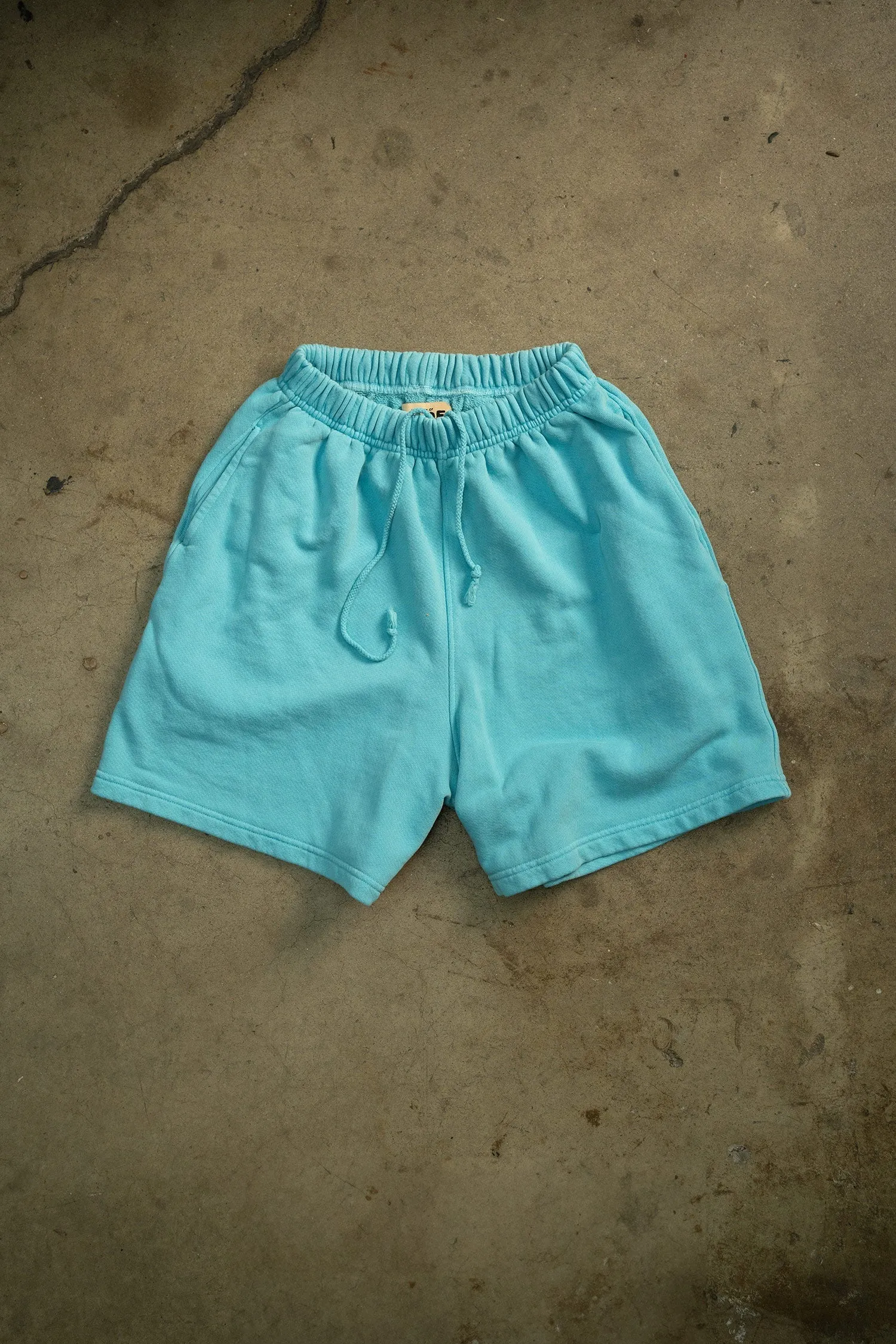 MADE WORN OVERSIZED SWEATSHORTS LAGOON sold by MadeWorn