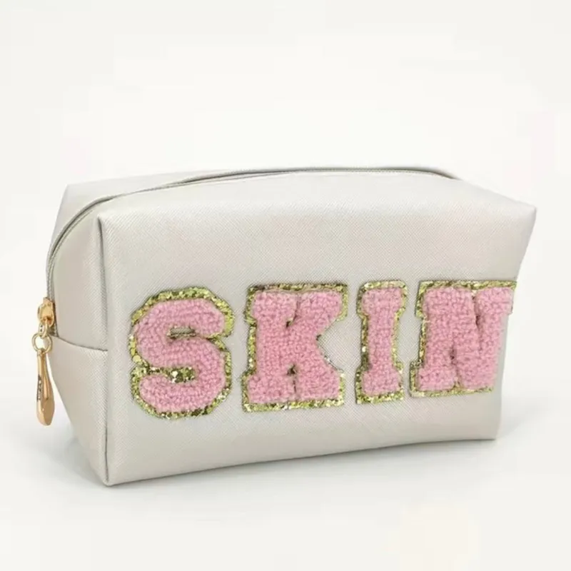 Skin Glam Cosmetic Bag Cream with Pink Letters sold by Sahira Jewelry Design