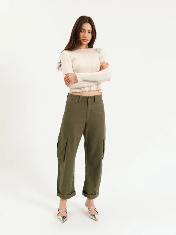 The Squad Cargo Pant in Bronze Green Embellished sold by Daze