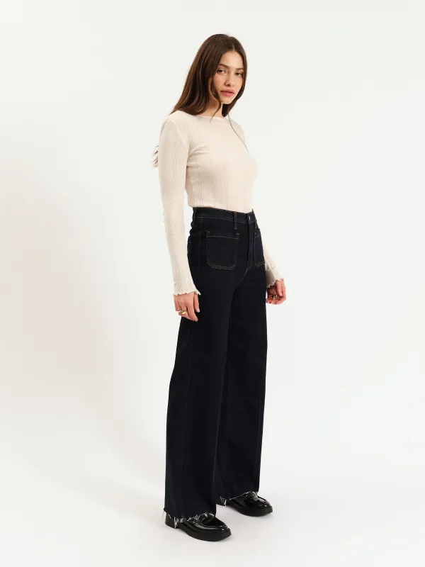 Far Out High Rise Wide Leg in Rinse sold by Daze