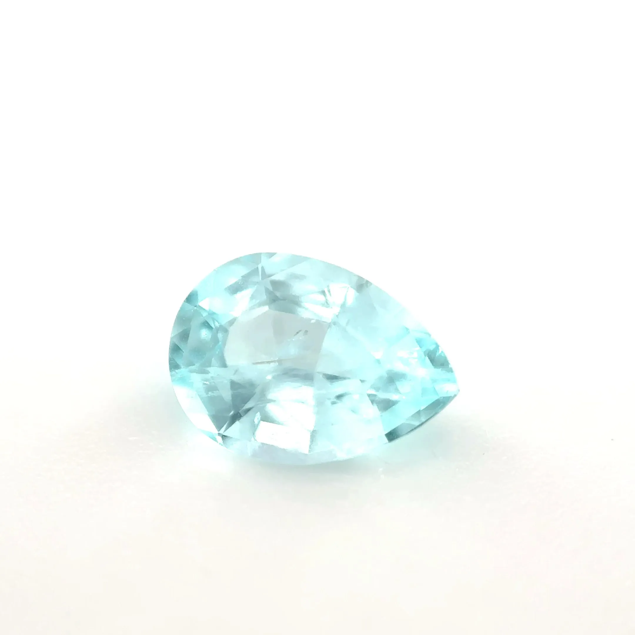 *COUTURE* Bespoke 0.67 Carat Pear Cut Paraíba Tourmaline sold by Stoned Fine Jewelry