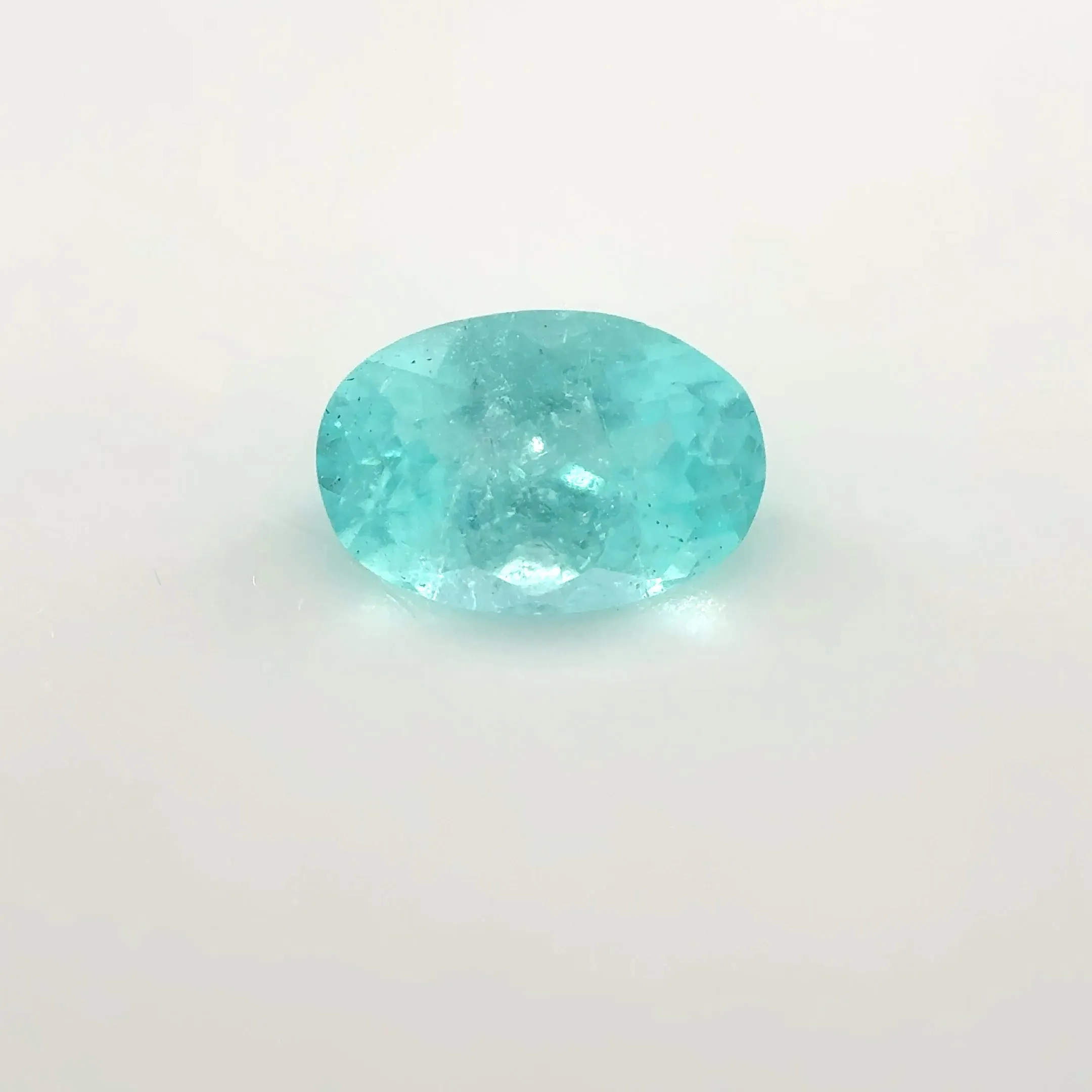 *COUTURE* Bespoke 0.56 Carat Oval Cut Paraíba Tourmaline sold by Stoned Fine Jewelry