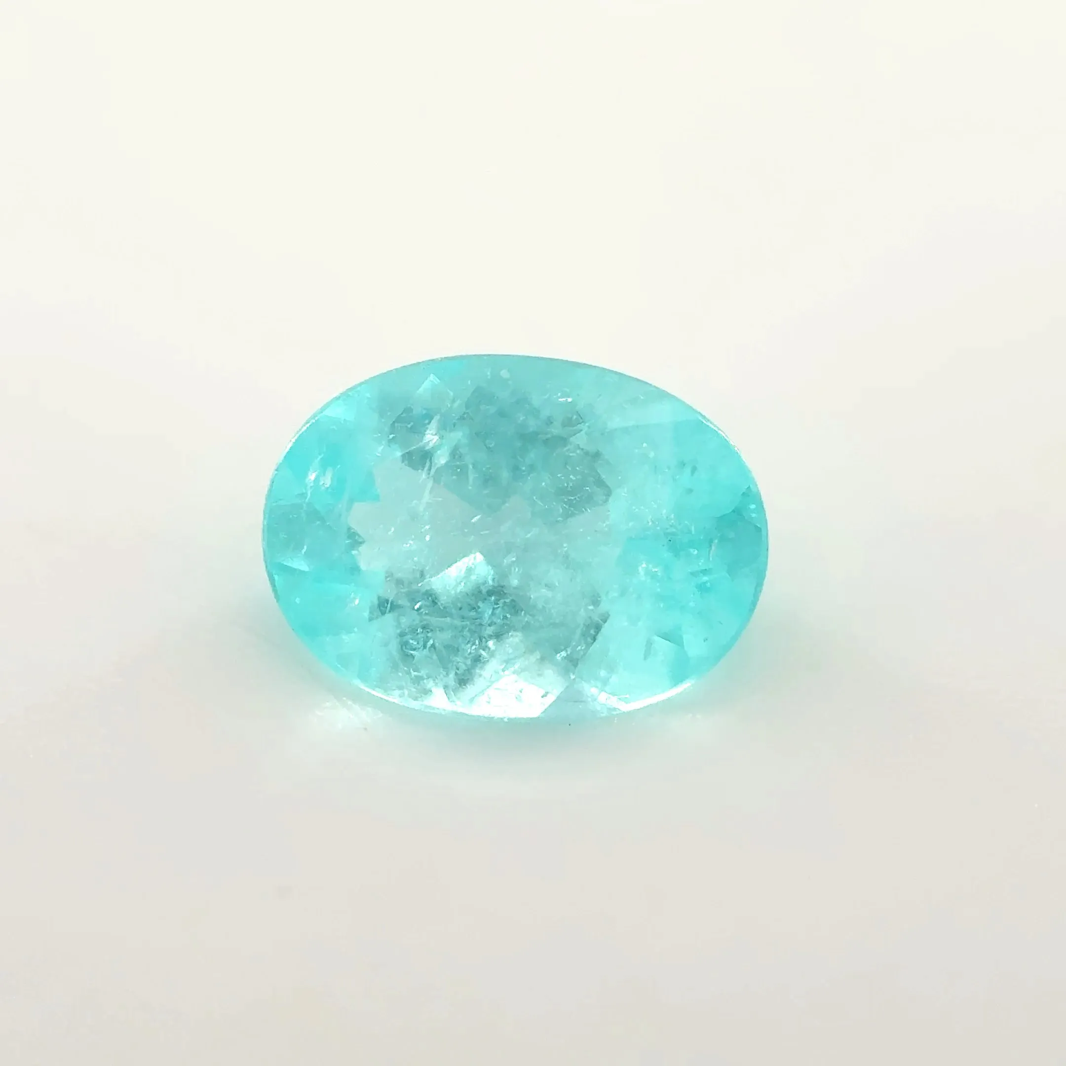 *COUTURE* Bespoke 0.71 Carat Oval Cut Paraíba Tourmaline sold by Stoned Fine Jewelry