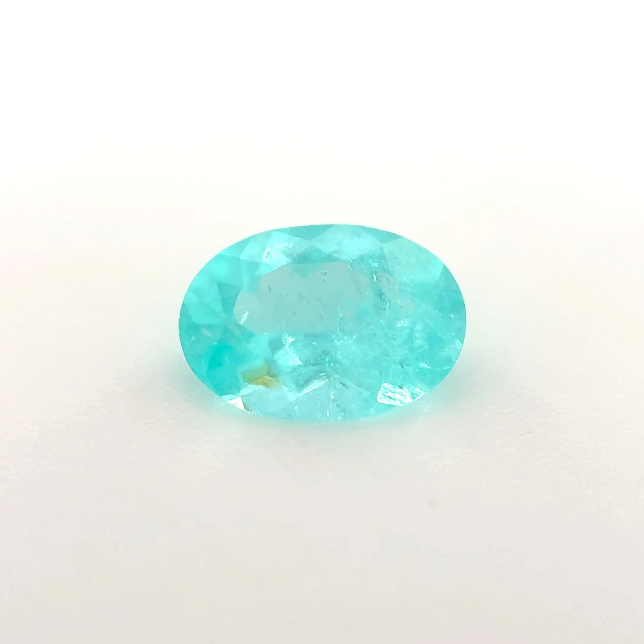 *COUTURE* Bespoke 0.63 Carat Oval Cut Paraíba Tourmaline sold by Stoned Fine Jewelry