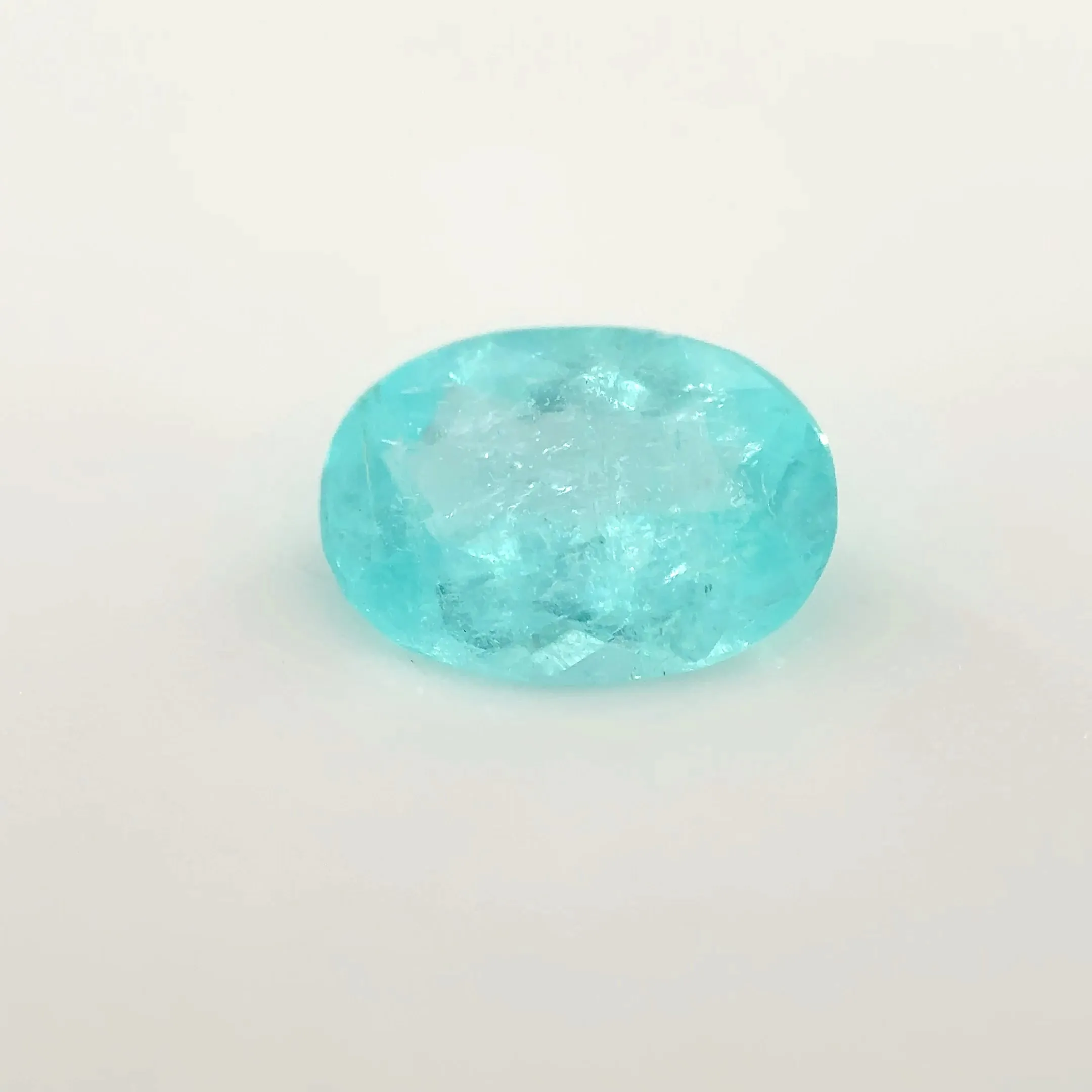 *COUTURE* Bespoke 0.68 Carat Oval Cut Paraíba Tourmaline sold by Stoned Fine Jewelry