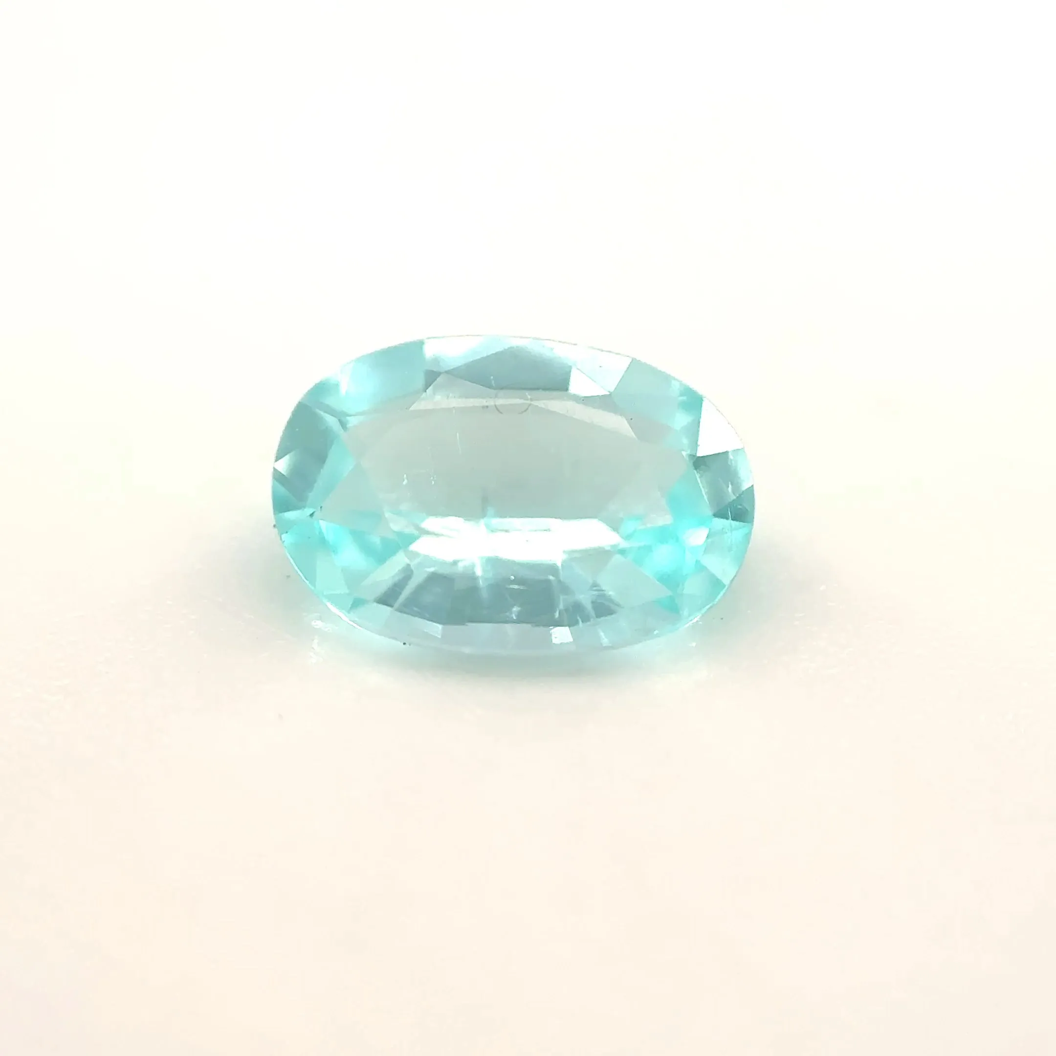 *COUTURE* Bespoke 0.69 Carat Oval Cut Paraíba Tourmaline sold by Stoned Fine Jewelry